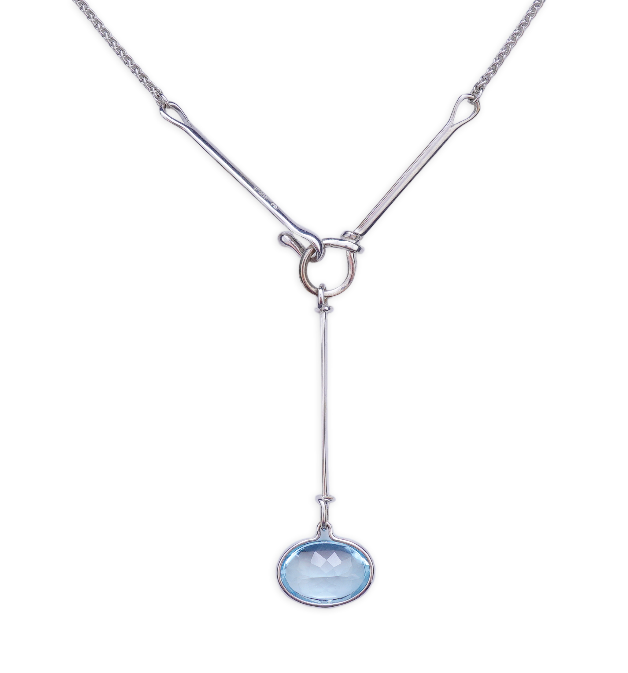 Georg Jensen, a blue topaz necklace, centring on a hook clasp suspending an oval blue topaz pendant, pendant length 5.5cm, necklace length 43cm, stamped GJ for Georg Jensen, 925S and European convention assay marks for s